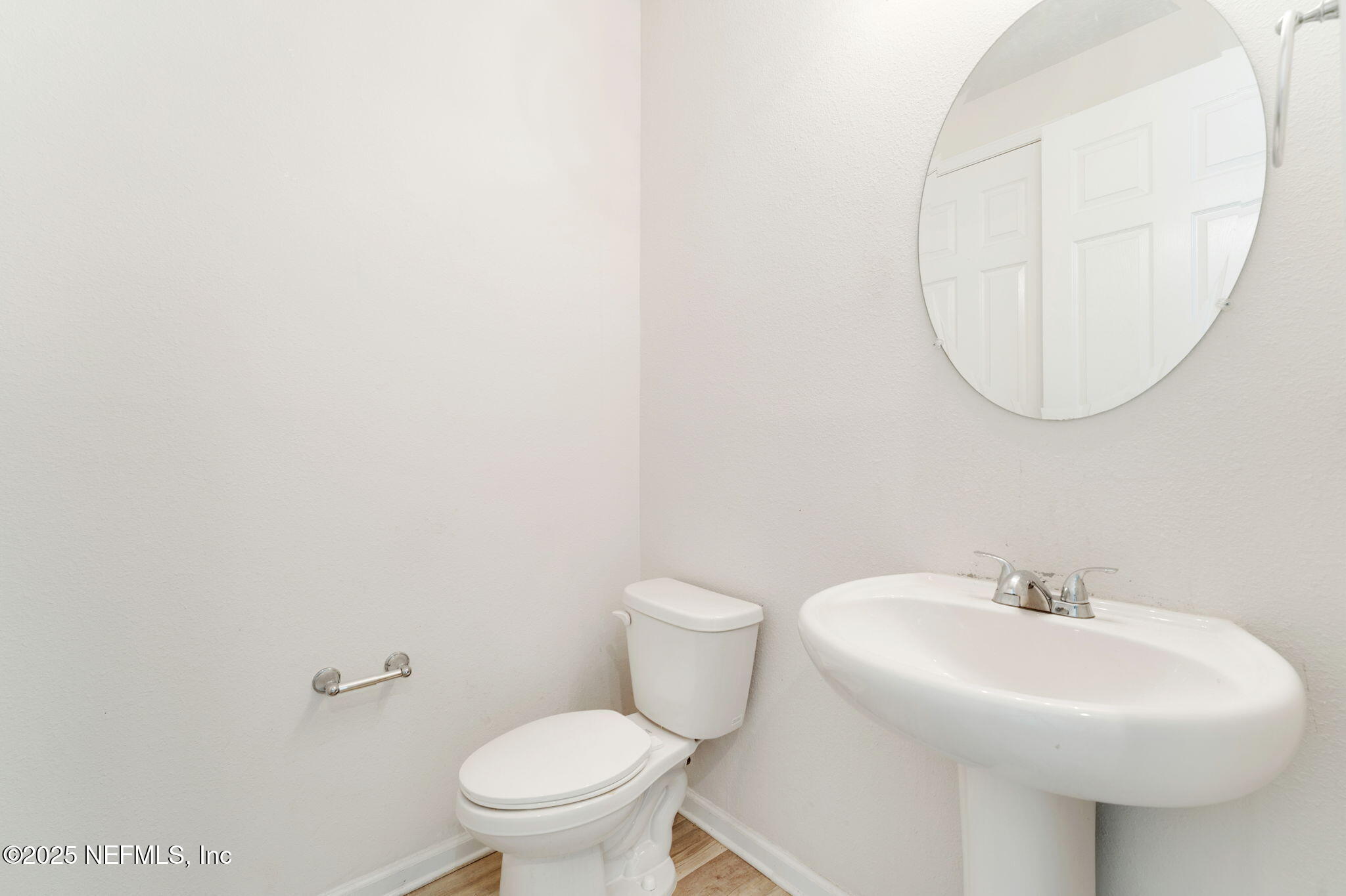 52 Opal Way St. Augustine, FL 32086 - Photo 25 of 55 a white toilet sitting next to a white sink