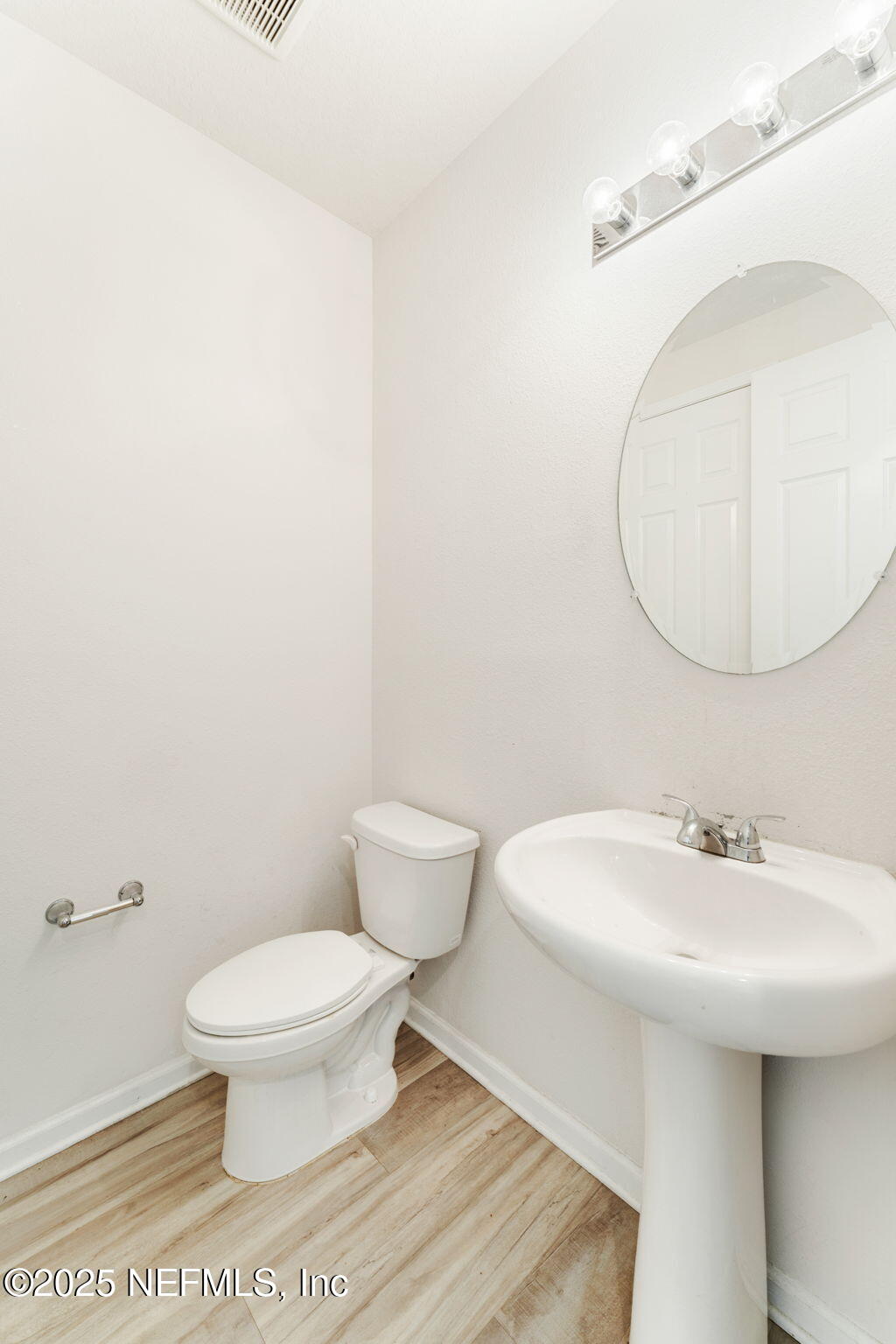 52 Opal Way St. Augustine, FL 32086 - Photo 26 of 55 a bathroom with a sink toilet and a mirror