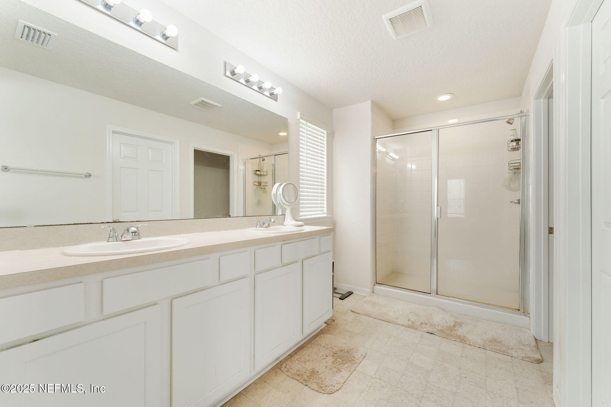 52 Opal Way St. Augustine, FL 32086 - Photo 33 of 55 a bathroom with a double vanity sink and mirror