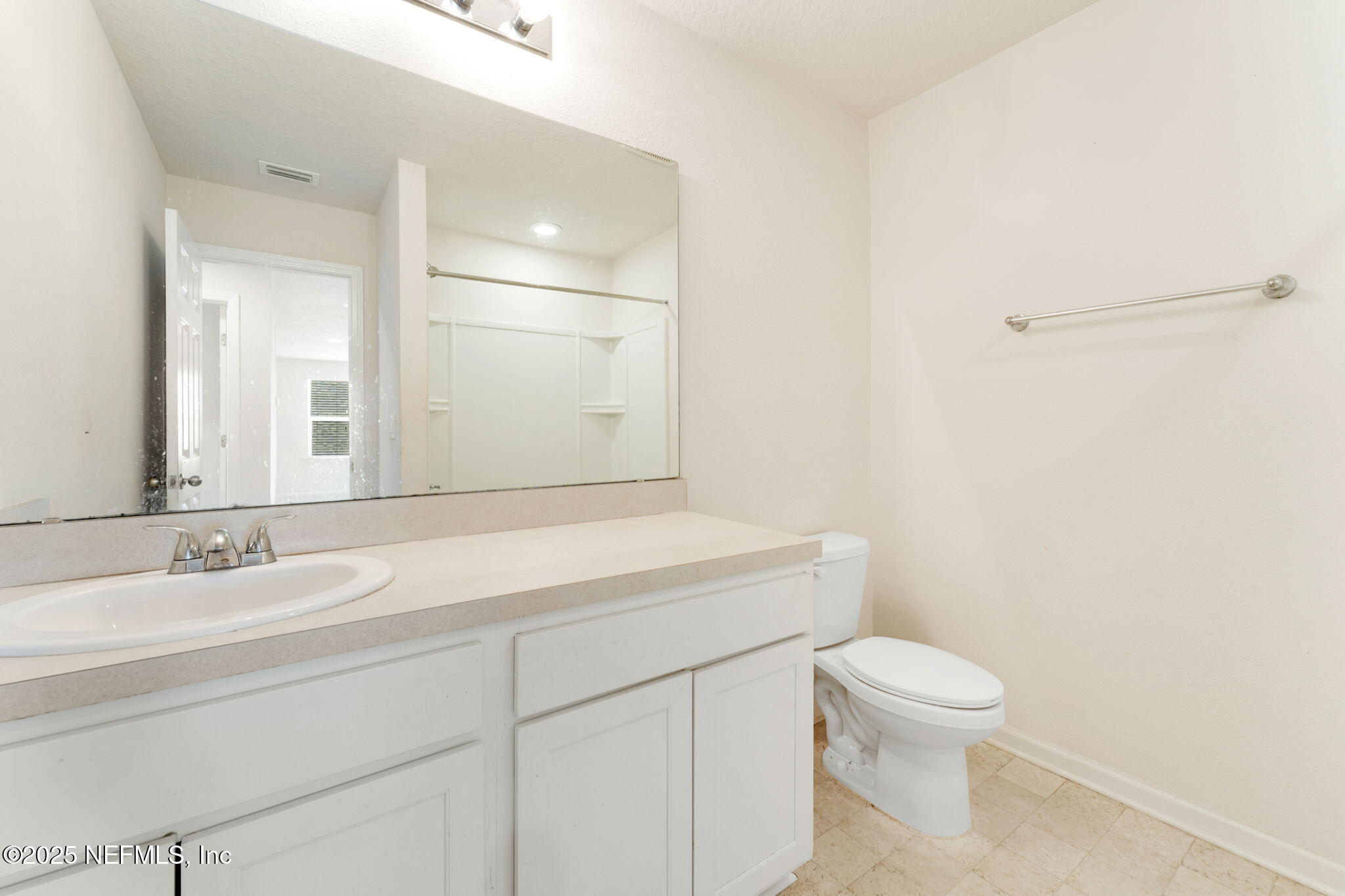 52 Opal Way St. Augustine, FL 32086 - Photo 37 of 55 a bathroom with a sink a toilet and a mirror