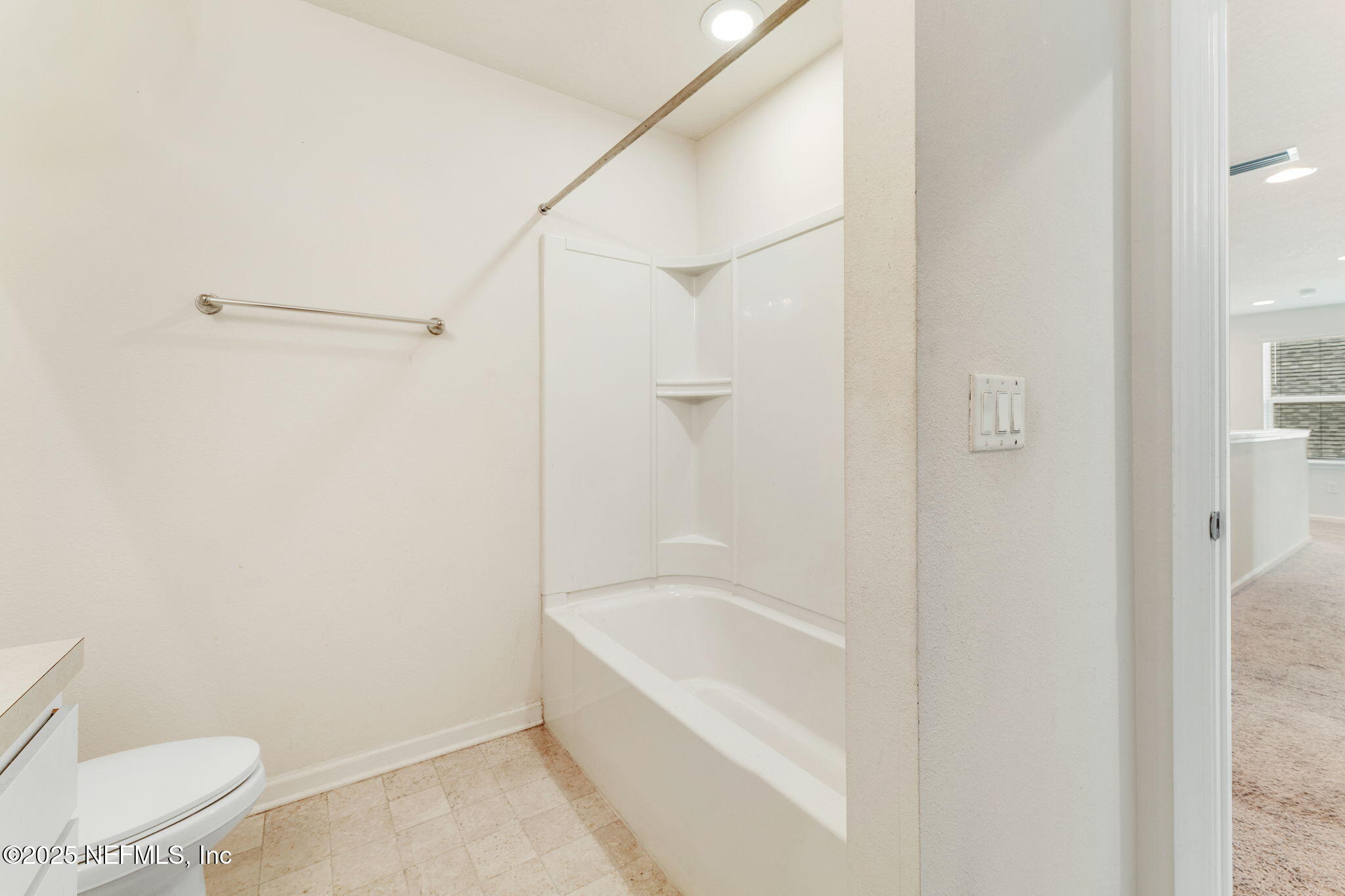 52 Opal Way St. Augustine, FL 32086 - Photo 38 of 55 a bathroom with a bathtub and a toilet