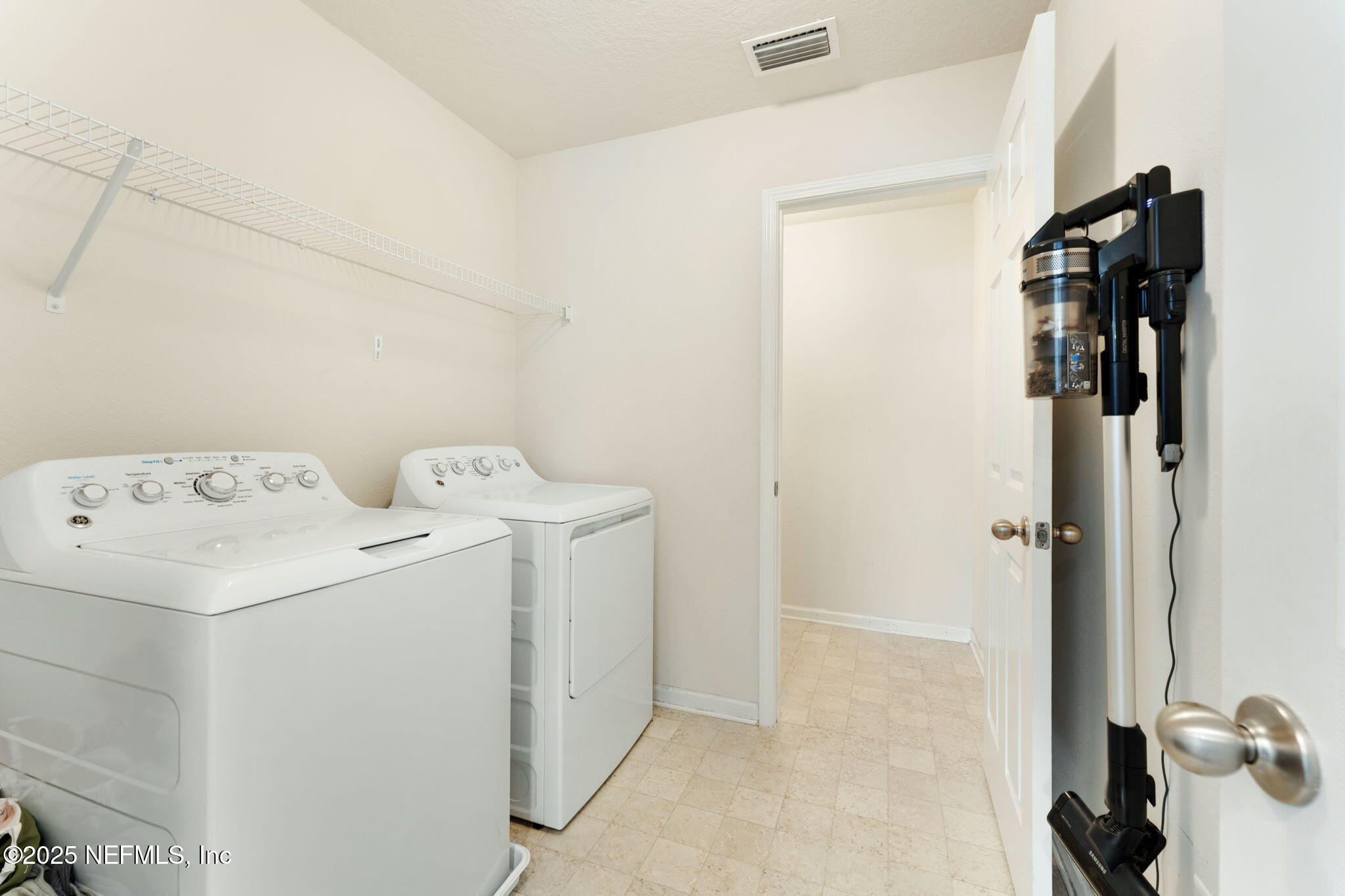 52 Opal Way St. Augustine, FL 32086 - Photo 39 of 55 a utility room with dryer and washer