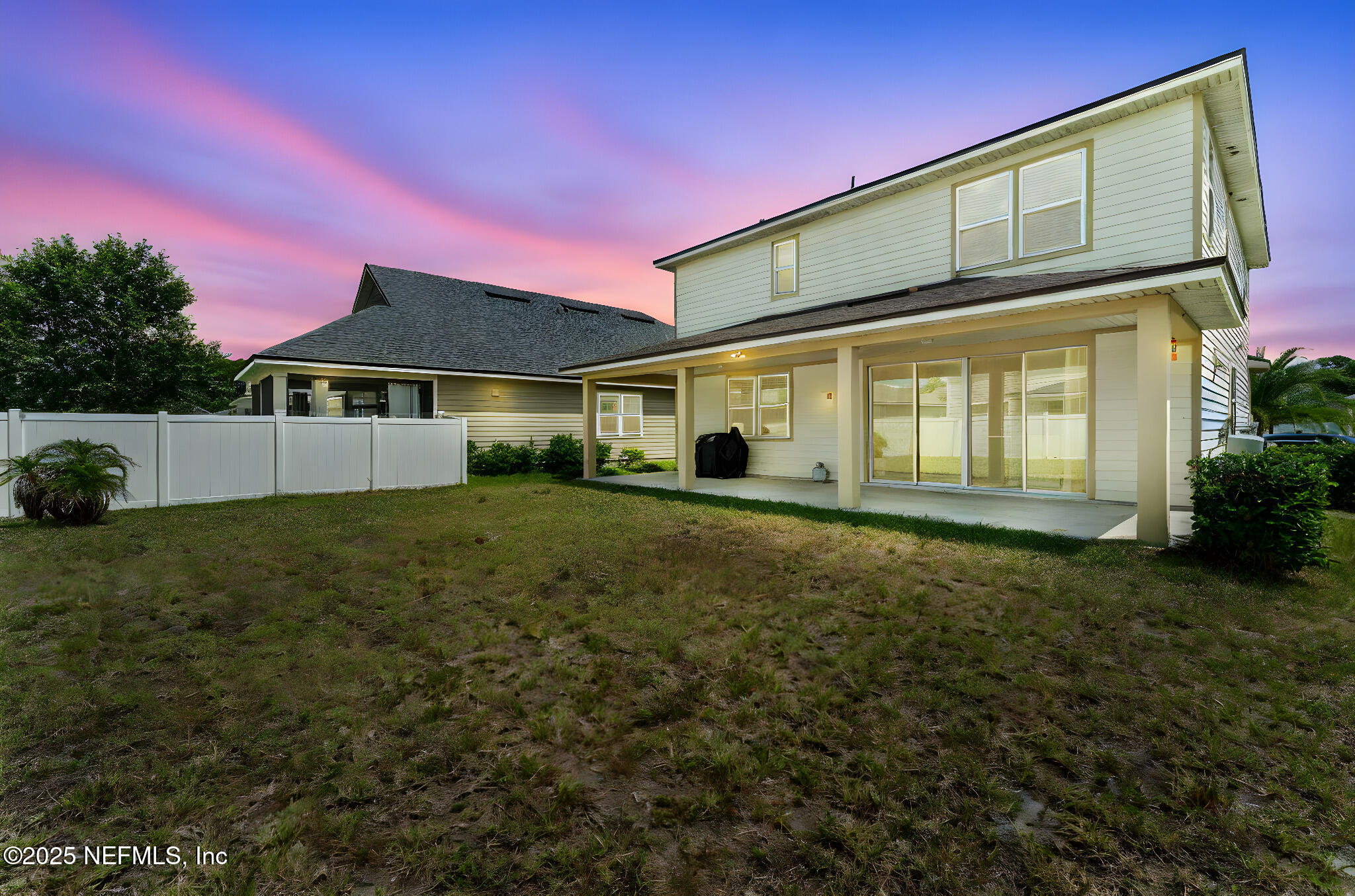 52 Opal Way St. Augustine, FL 32086 - Photo 43 of 55 a front view of a house with a yard