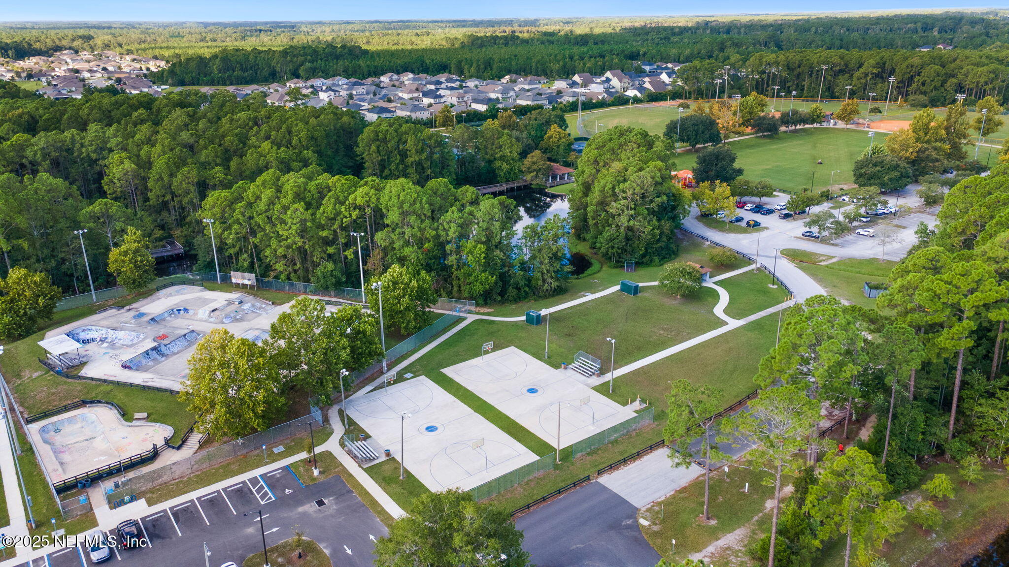 52 Opal Way St. Augustine, FL 32086 - Photo 54 of 55 an aerial view of a residential houses with outdoor space and lake view