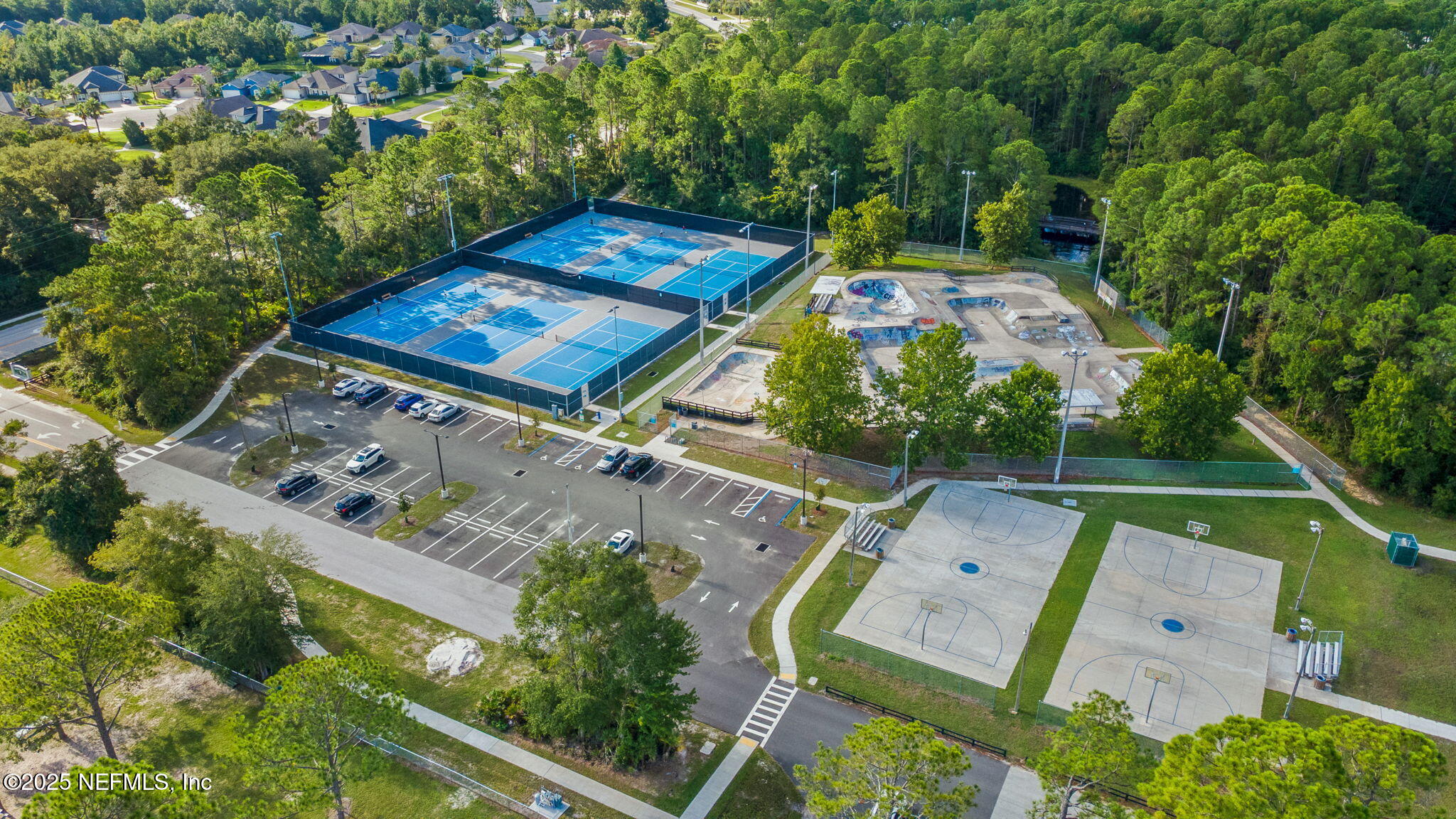 52 Opal Way St. Augustine, FL 32086 - Photo 55 of 55 an aerial view of a residential houses with yard