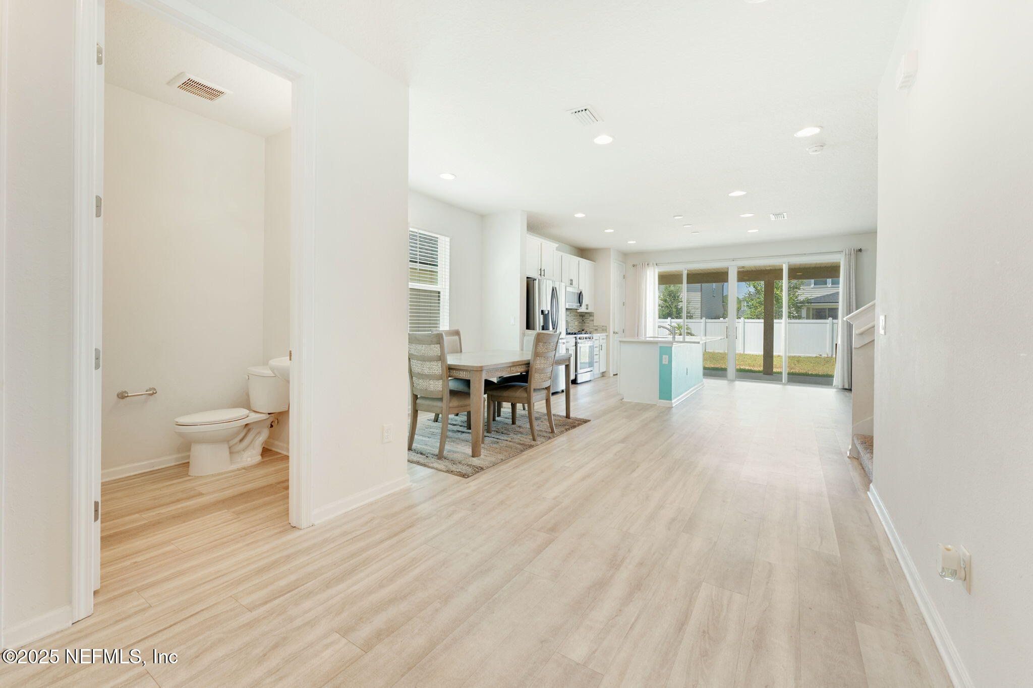 52 Opal Way St. Augustine, FL 32086 - Photo 8 of 55 a view of a room with wooden floor and furniture