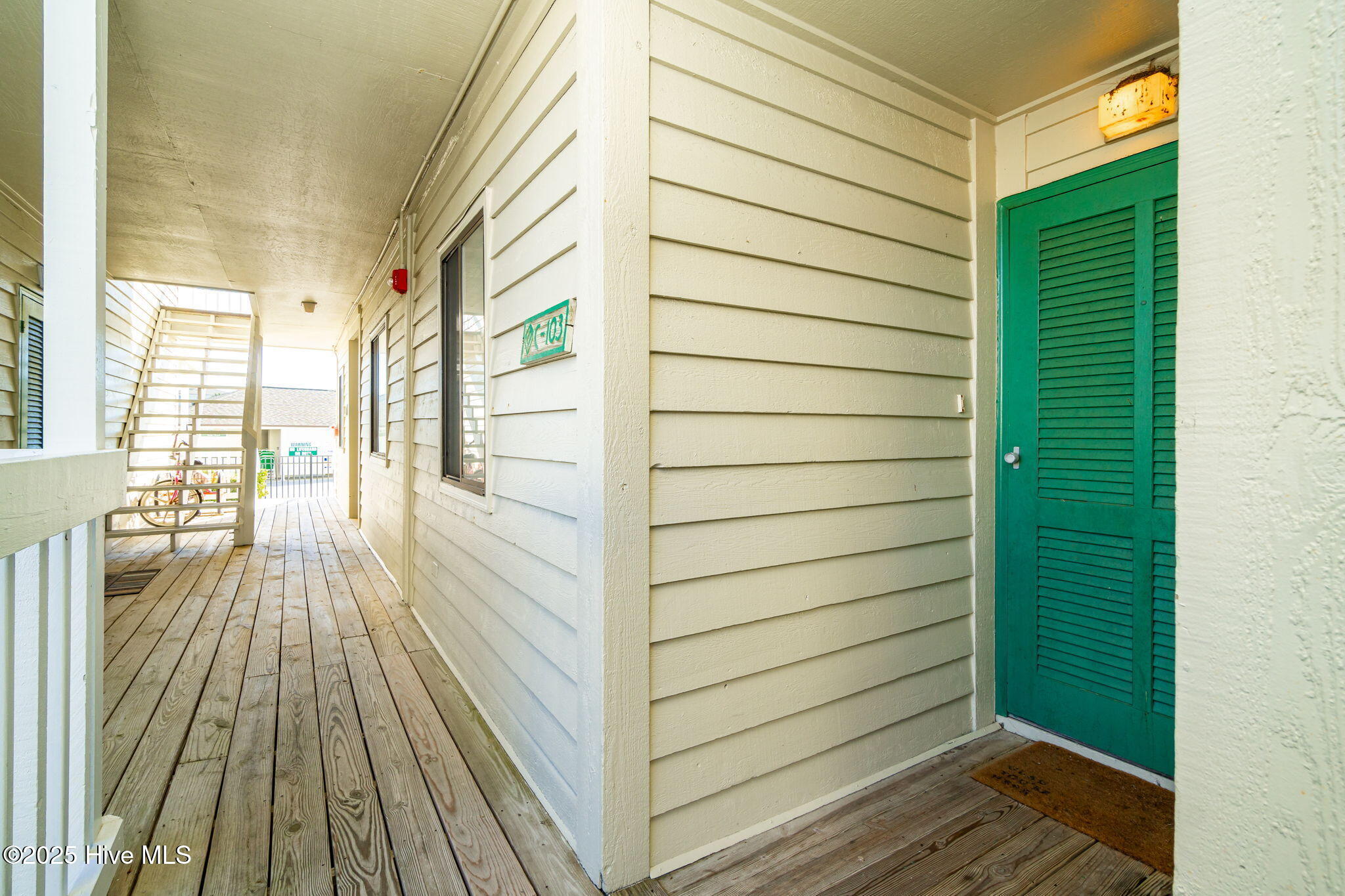 10300 Coast Guard Road, Unit C103 POINT EMERALD VILLAS Emerald Isle, NC 28594 - Photo 26 of 44 Entrance to unit C-103