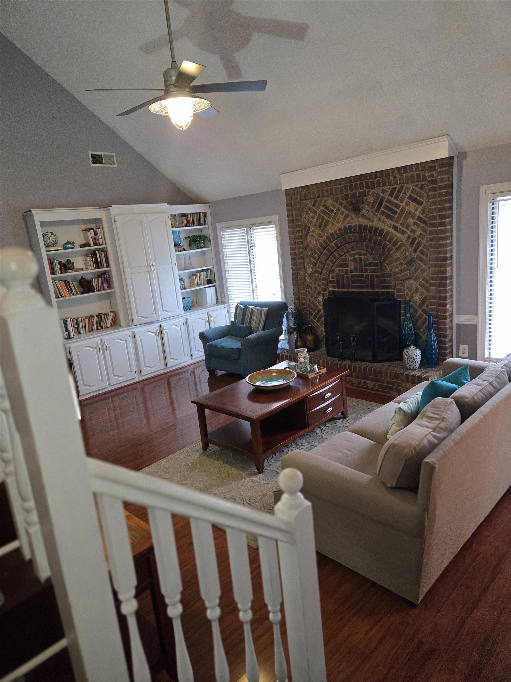 3950 Bobby Jones Road Memphis, TN 38125 - Photo 5 of 21 Living room with a healthy amount of sunlight, visible vents, wood finished floors, and ceiling fan