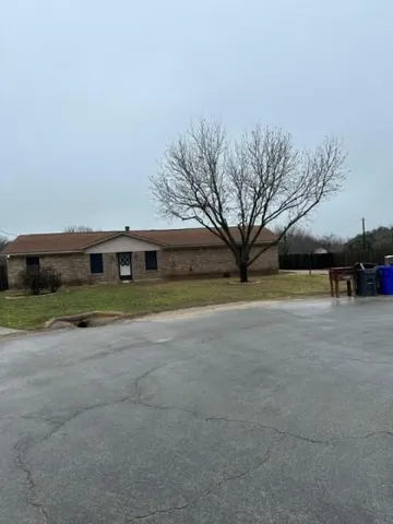 a view of house with outdoor space