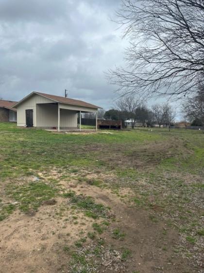 409 Skyline Circle Lorena, TX 76655 - Photo 16 of 16 a view of a house with a yard