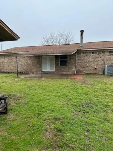 a view of a backyard with a garden