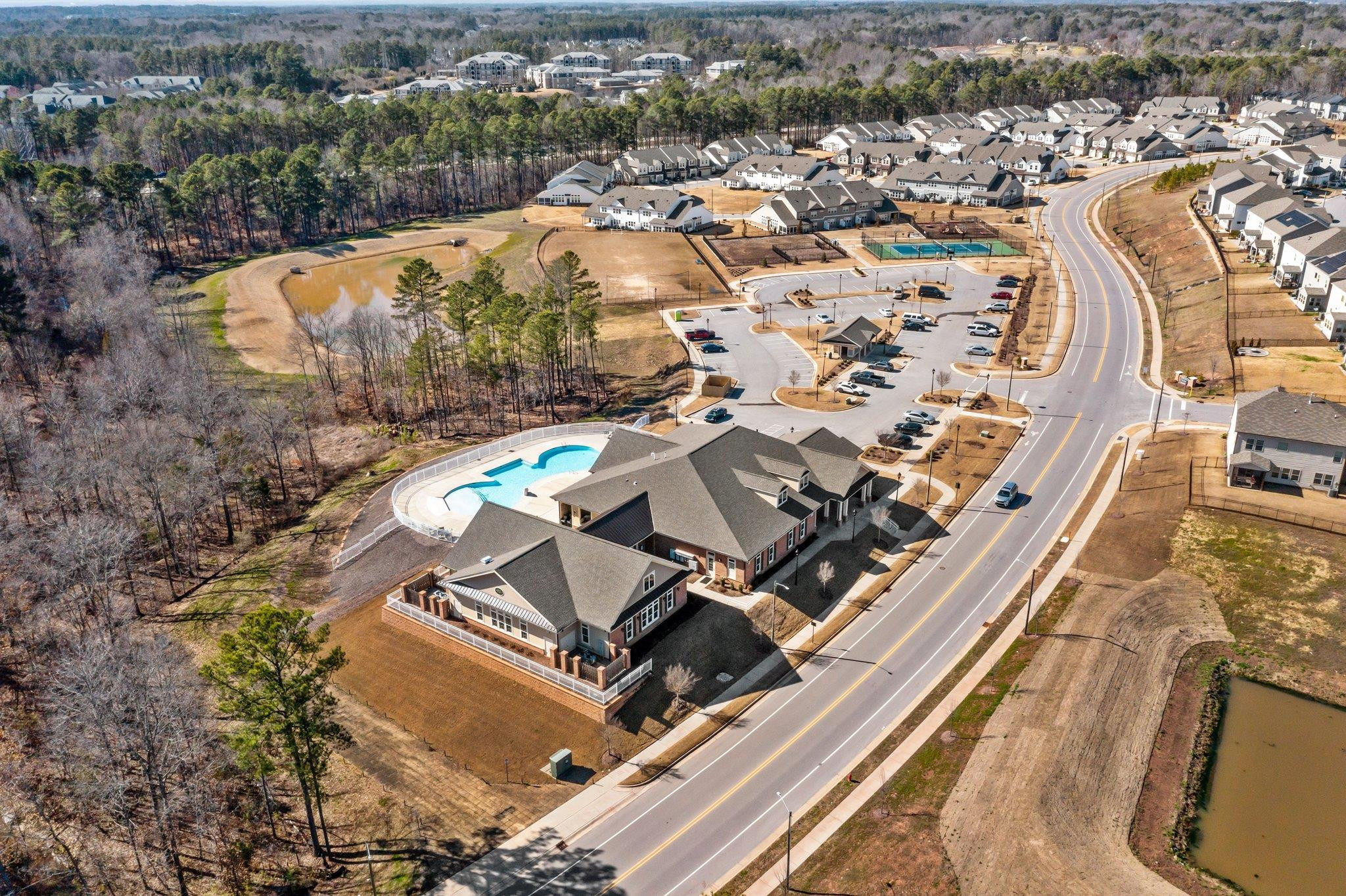 1405 Wrenn Road Durham, NC 27703 - Photo 26 of 28 Club house with Gym and Indoor pool, Outdoor Pool, Tennis and Basketball courts, Play areas, & Soccer field. Clubhouse/Sports complex