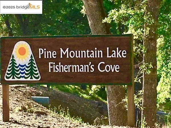 a sign on the street of a building