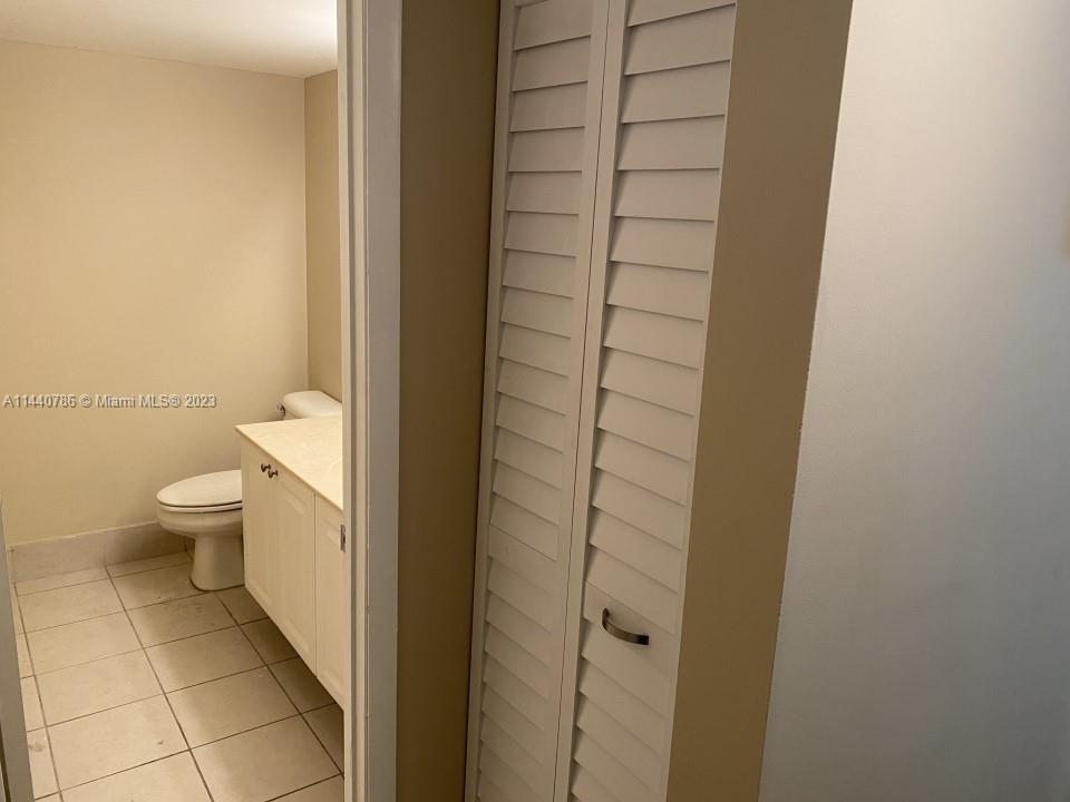 721 North Pine Island Road, Unit 304 Plantation, FL 33324 - Photo 17 of 22 a bathroom with a toilet and a shower