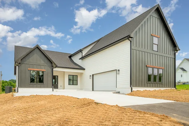 a house view with a garden space
