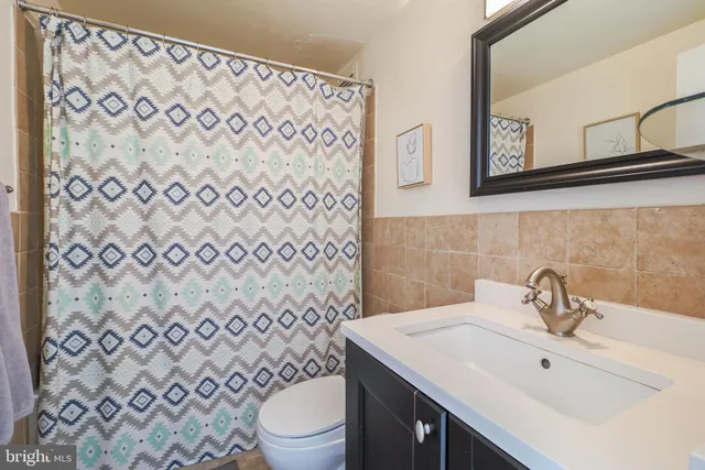 a bathroom with a sink and a toilet