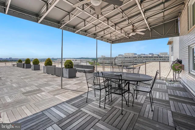 a view of a chairs and table on the terrace