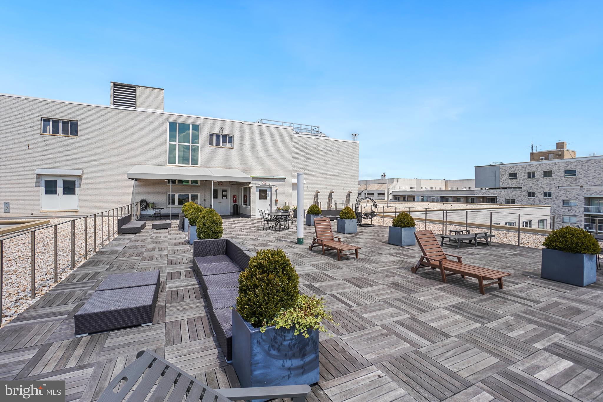 2475 Virginia Avenue Northwest, Unit 728 Washington, DC 20037 - Photo 23 of 32 a view of a terrace with chairs