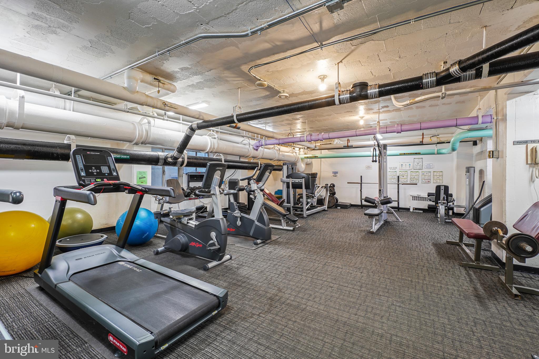 2475 Virginia Avenue Northwest, Unit 728 Washington, DC 20037 - Photo 24 of 32 a view of a room with gym equipment