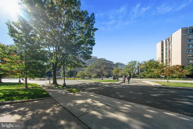 a view of street with houses and trees