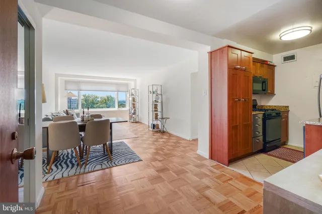 a view of a dining room with furniture window and outside view