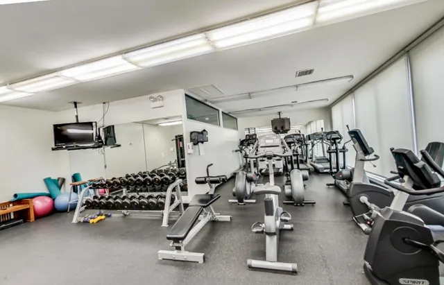 a view of a room with gym equipment