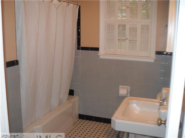 634 Colonial Drive High Point, NC 27262 - Photo 11 of 16 Other. Full bath adjacent to master and second bedroom. Tile floors and walls.
