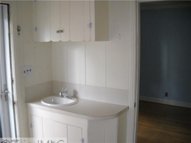 634 Colonial Drive High Point, NC 27262 - Photo 13 of 16 Other. Mudroom entry off of the drive has sink for washing up after working in the yard.