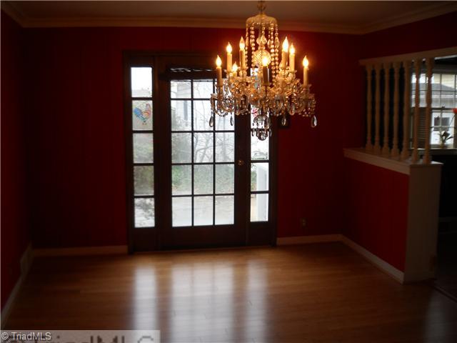 634 Colonial Drive High Point, NC 27262 - Photo 3 of 16 Dining Room. Dining room is open to the kitchen and living room. Easy access to the slate patio in the rear of the home