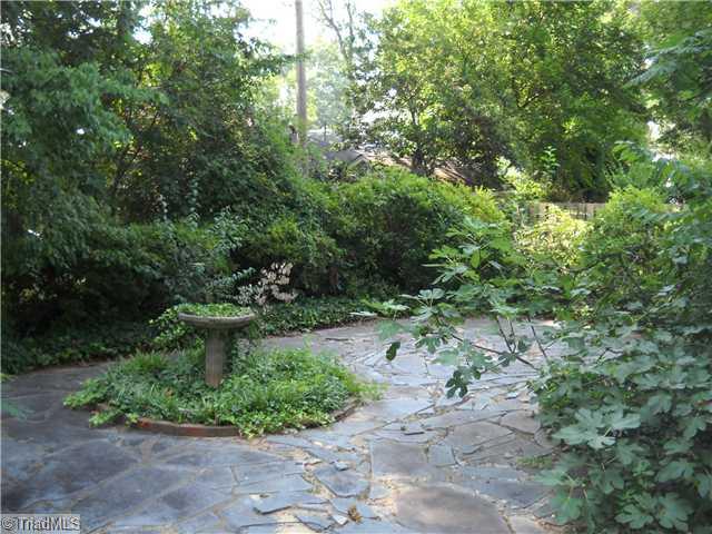 634 Colonial Drive High Point, NC 27262 - Photo 8 of 16 Yard/Garden. Slate patio.