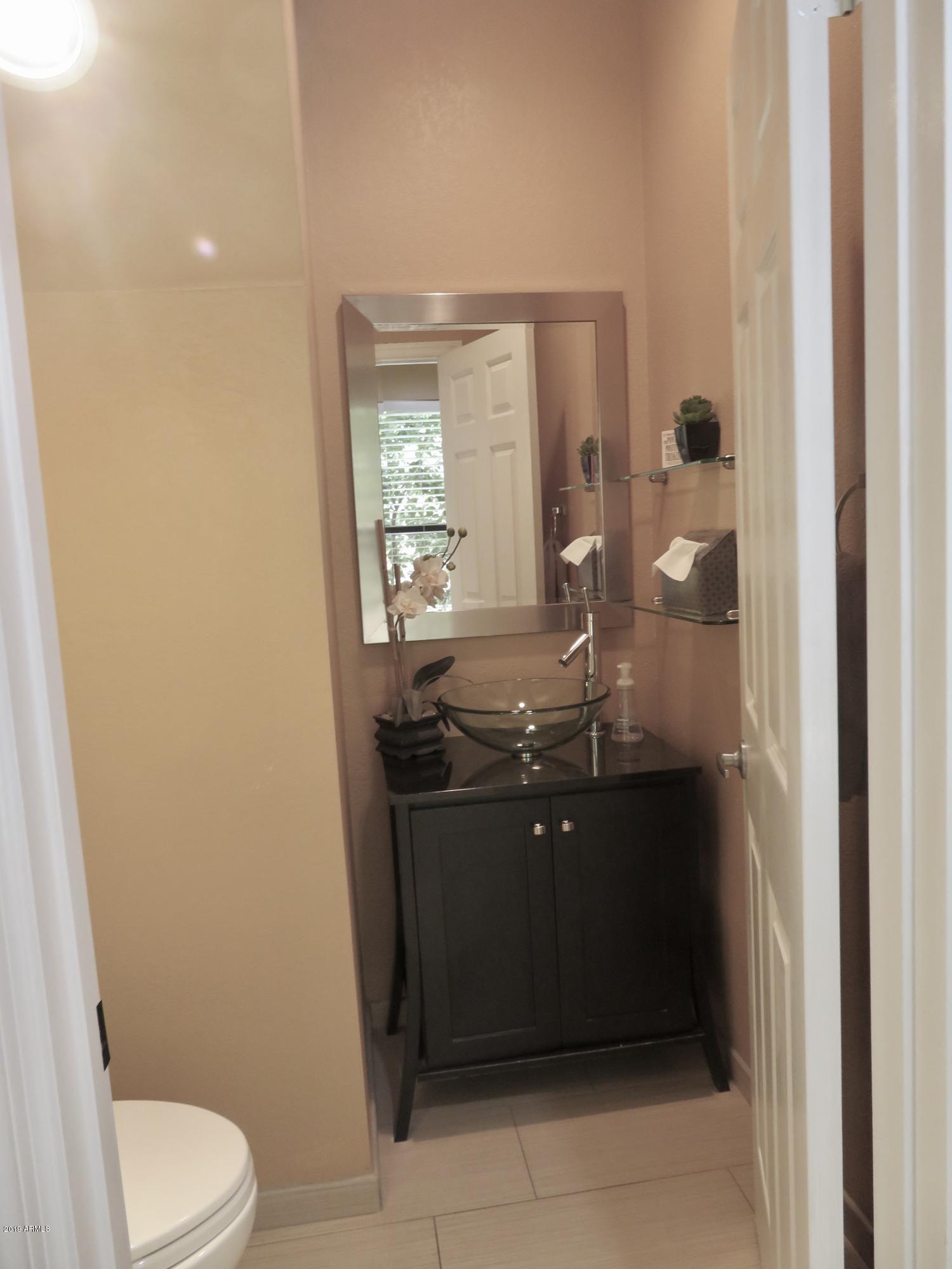 7272 East Gainey Ranch Road, Unit 126 Scottsdale, AZ 85258 - Photo 21 of 56 DOWNSTAIRS POWDER ROOM