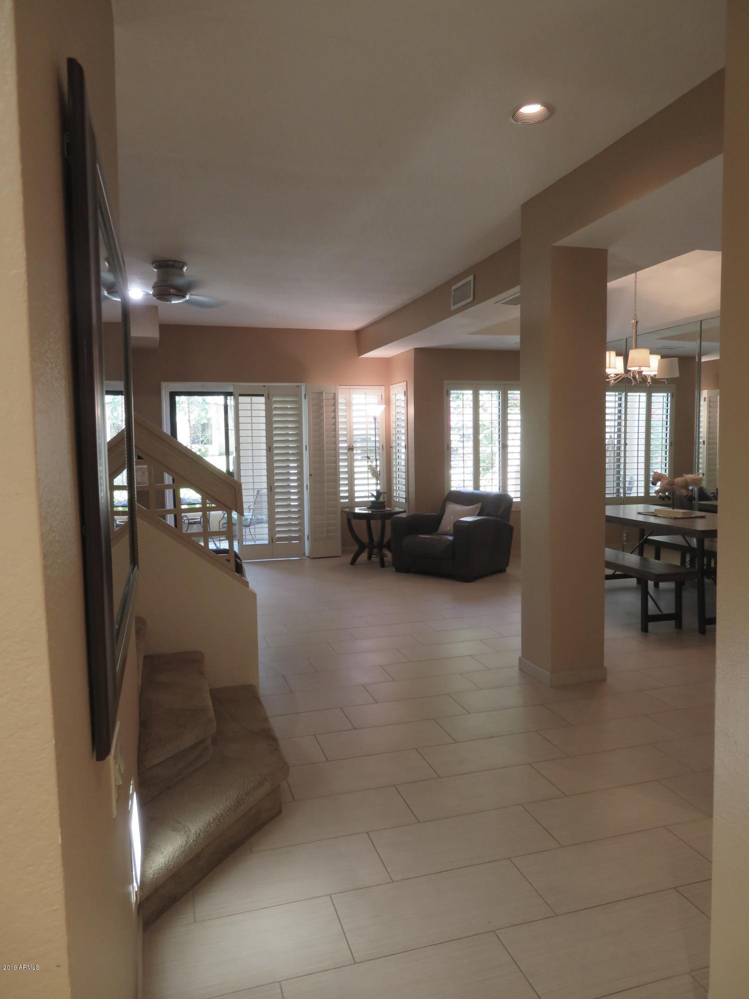 7272 East Gainey Ranch Road, Unit 126 Scottsdale, AZ 85258 - Photo 55 of 56 ENTER INTO SPACIOUS OPEN FLOOR PLAN