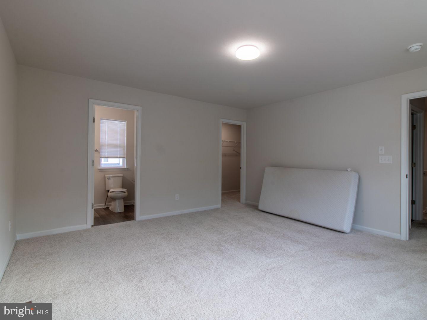617 R Wilson Loop Georgetown, DE 19947 - Photo 11 of 13 a view of an empty room with a window