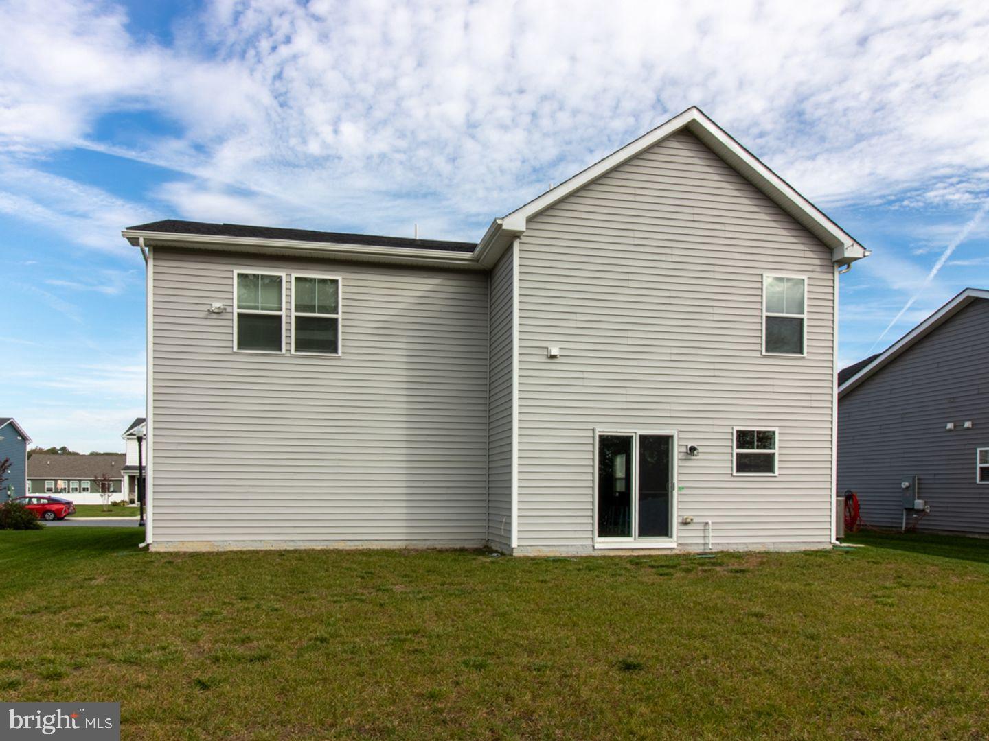 617 R Wilson Loop Georgetown, DE 19947 - Photo 12 of 13 a view of a house with a yard