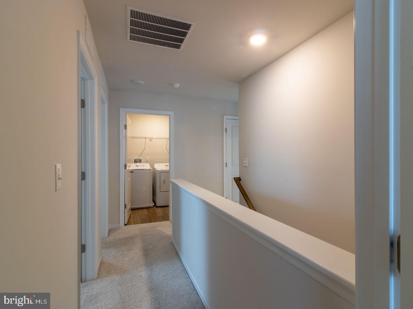 617 R Wilson Loop Georgetown, DE 19947 - Photo 7 of 13 a view of hallway with bathroom