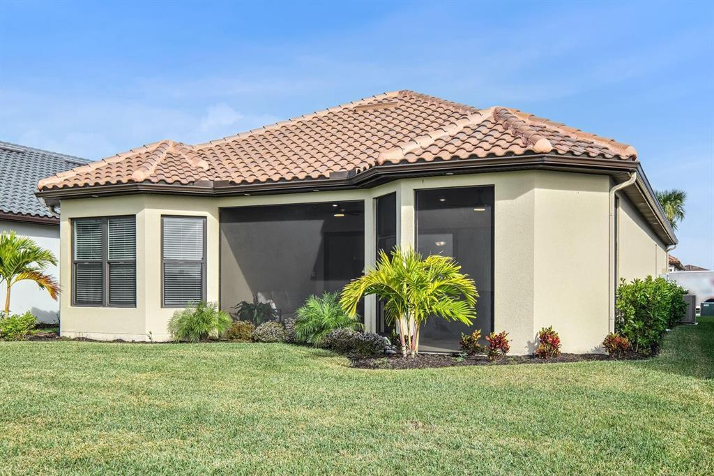 9796 Southwest Santini Rd Port Street Port St. Lucie, FL 34987 - Photo 17 of 29 Another View of Rear of Home - Copy