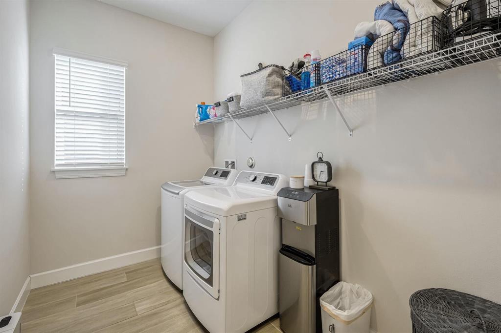 9796 Southwest Santini Rd Port Street Port St. Lucie, FL 34987 - Photo 20 of 29 Laundry Room with Window, Smart Samsung