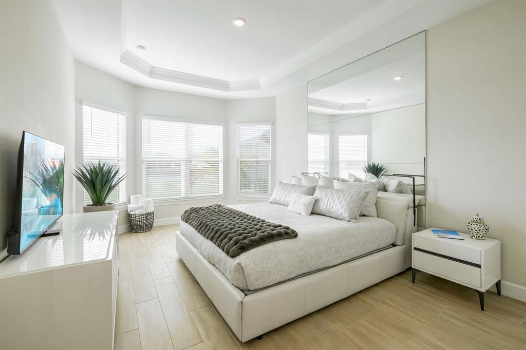 9796 Southwest Santini Rd Port Street Port St. Lucie, FL 34987 - Photo 4 of 29 Primary Bedroom with Fabulous Furnishing