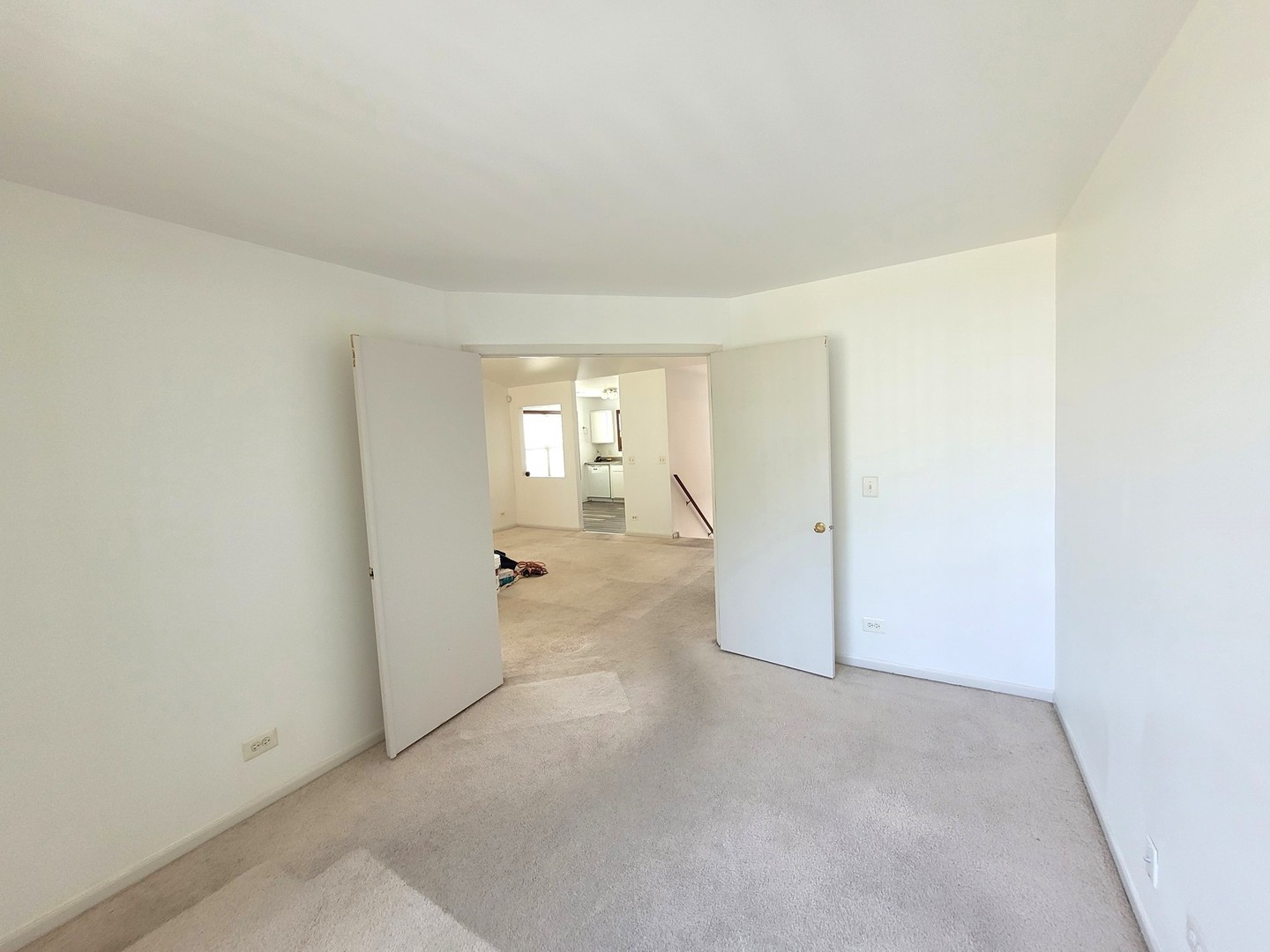 321 Sheffield Drive, Unit 321 Schaumburg, IL 60107 - Photo 8 of 21 a view of a big room with windows and chandelier fan