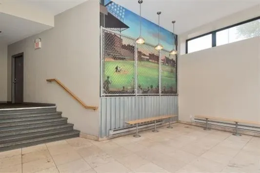 a view of a car parked in front of a building