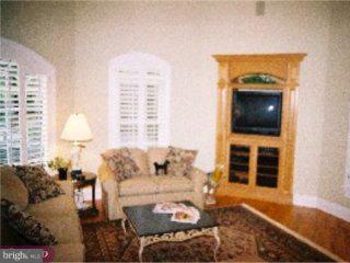 67 Lafayette Road Princeton, NJ 08540 - Photo 4 of 4 a living room with furniture and a flat screen tv