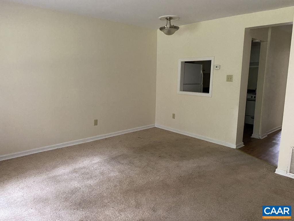 455 Burgoyne Road, Unit 8 Charlottesville, VA 22901 - Photo 4 of 12 a view of empty room with windows