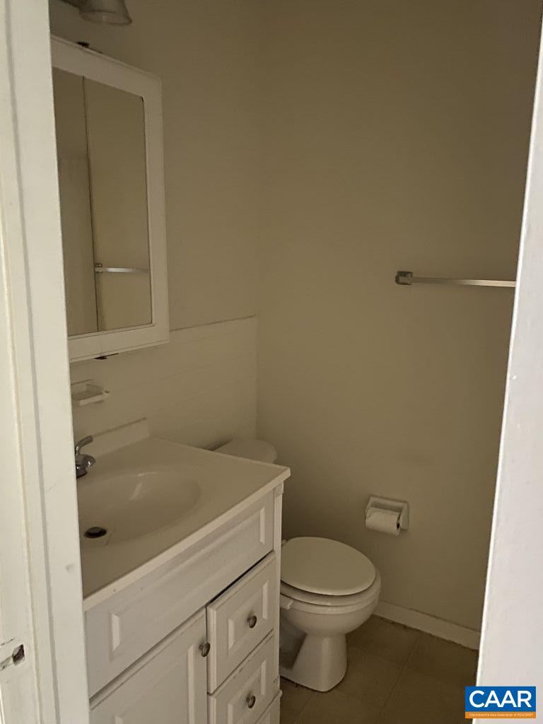 455 Burgoyne Road, Unit 8 Charlottesville, VA 22901 - Photo 7 of 12 a bathroom with a sink and a toilet