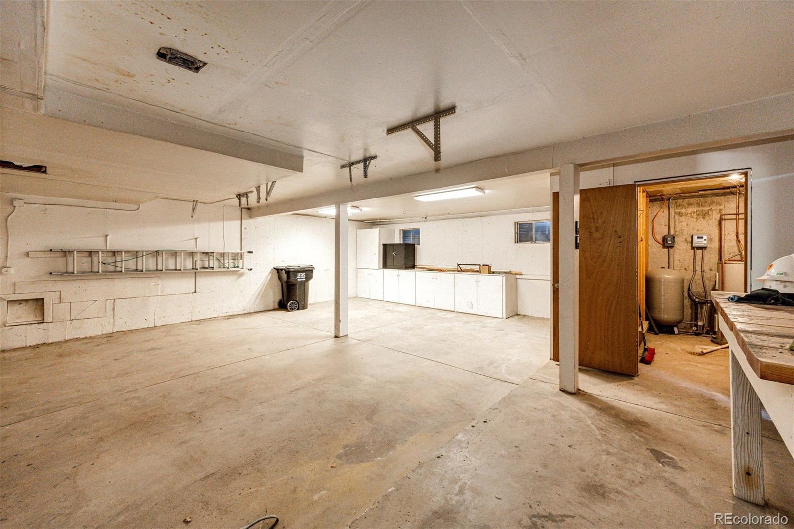 7417 Rafter Road Franktown, CO 80116 - Photo 27 of 37 a view of a storage & utility room