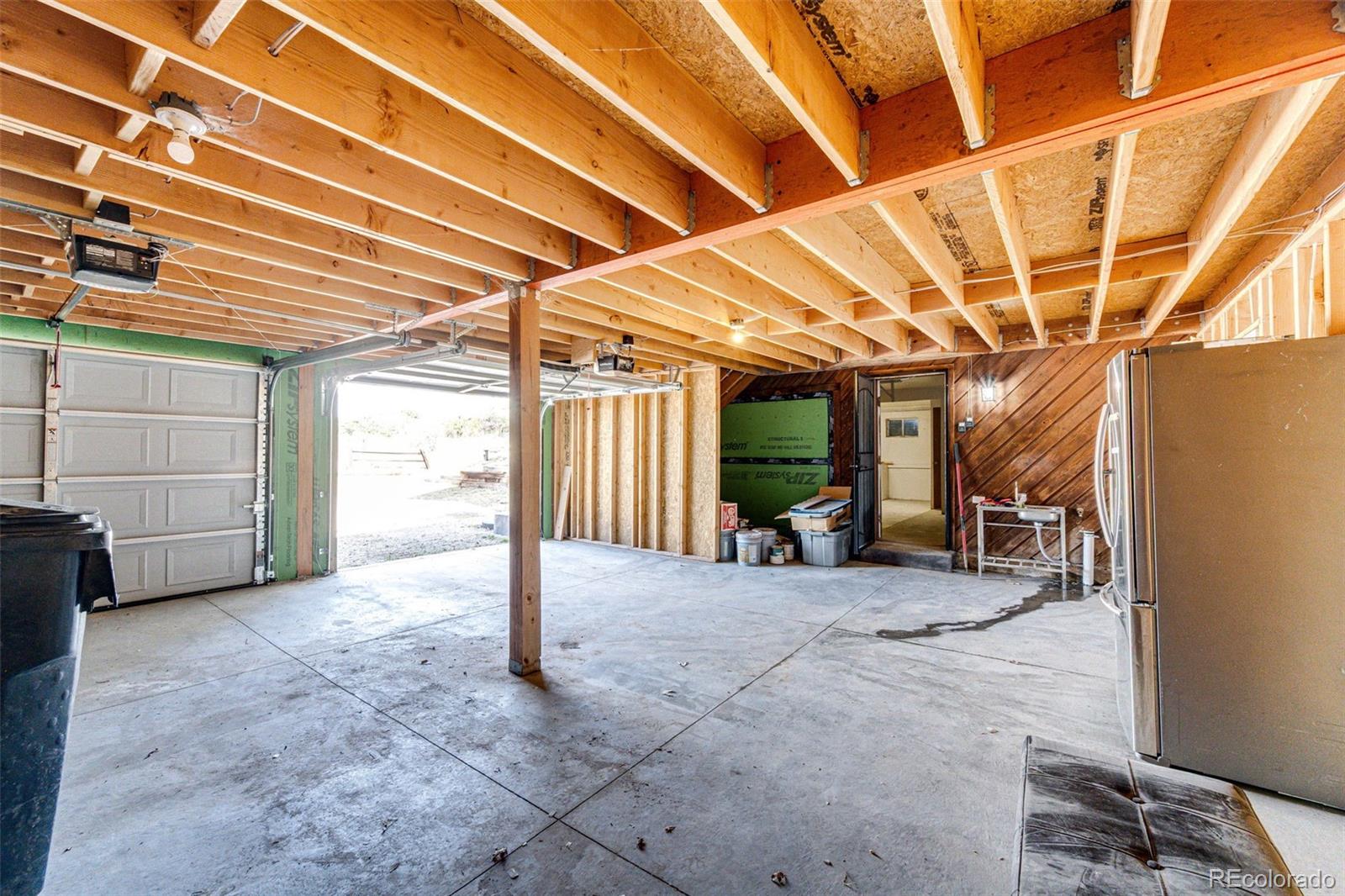 7417 Rafter Road Franktown, CO 80116 - Photo 29 of 37 a view of a garage