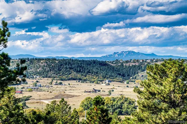 a view of a yard with a snow