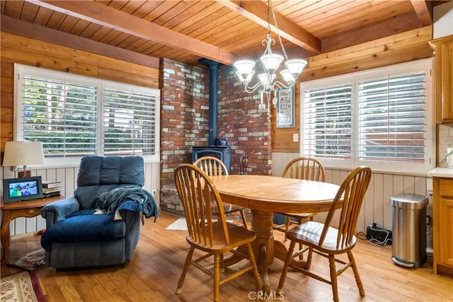 a kitchen with stainless steel appliances kitchen island granite countertop a refrigerator stove microwave and sink