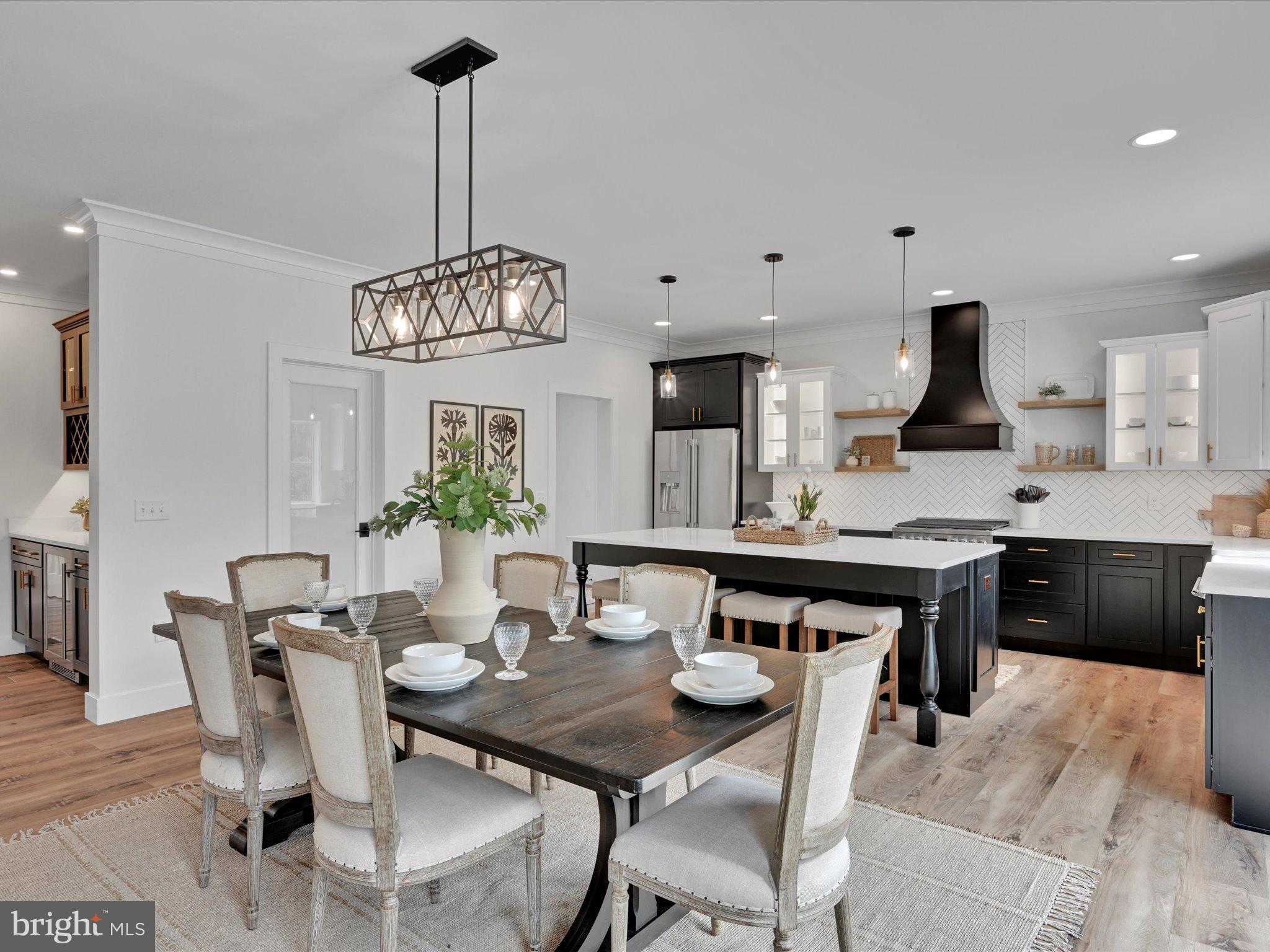 335 Royal Hunt Way Lititz, PA 17543 - Photo 19 of 49 a view of a dining room with furniture and wooden floor