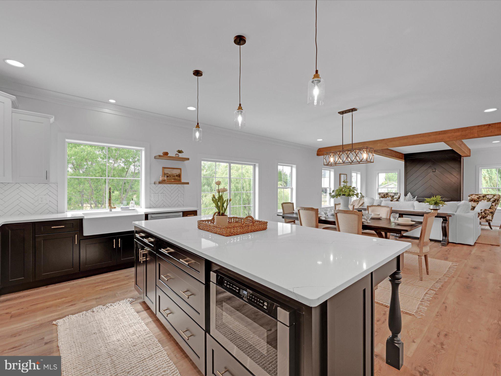 335 Royal Hunt Way Lititz, PA 17543 - Photo 22 of 49 a kitchen with stainless steel appliances granite countertop a sink and a stove