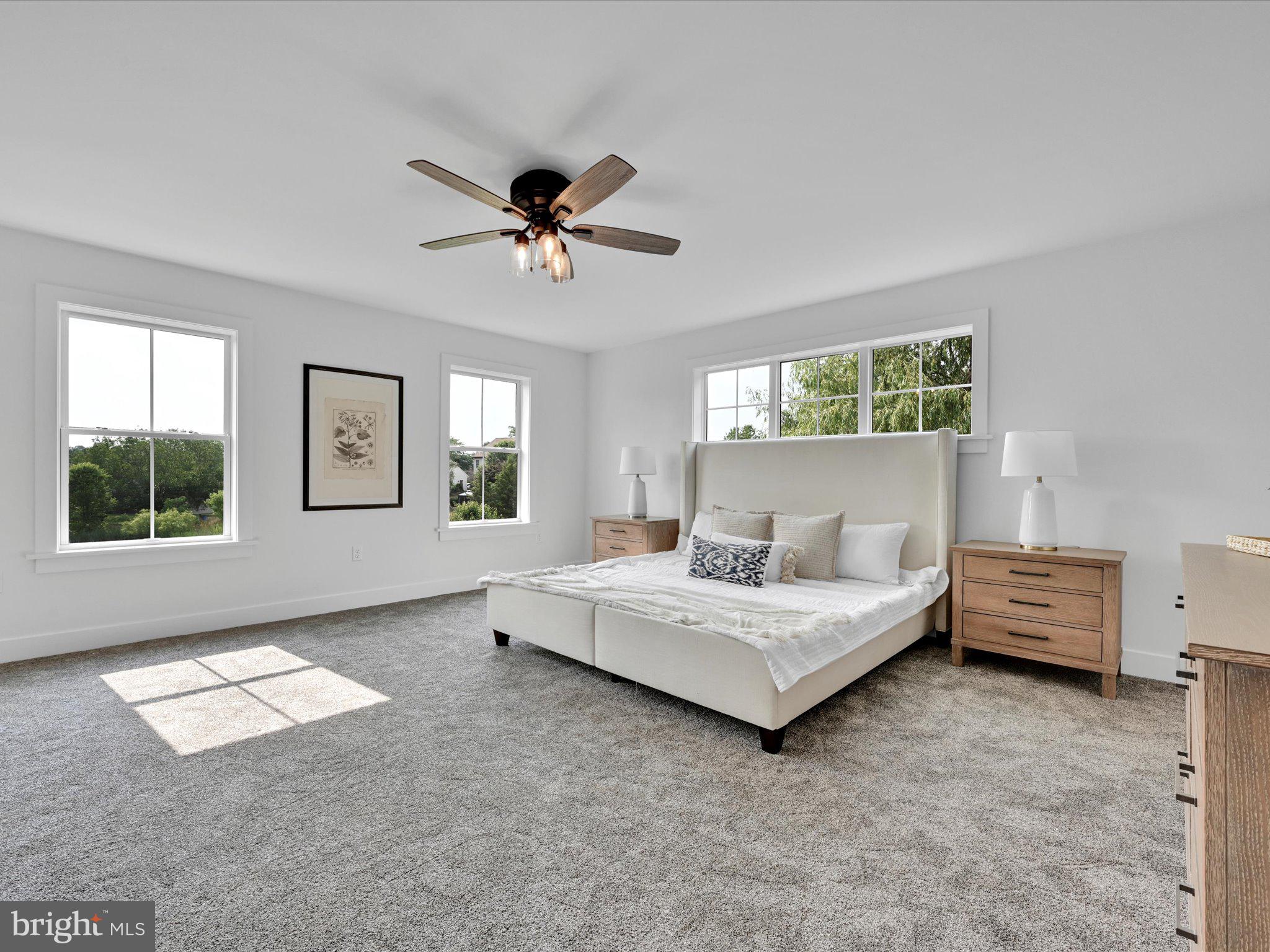335 Royal Hunt Way Lititz, PA 17543 - Photo 26 of 49 a spacious bedroom with a bed and a window